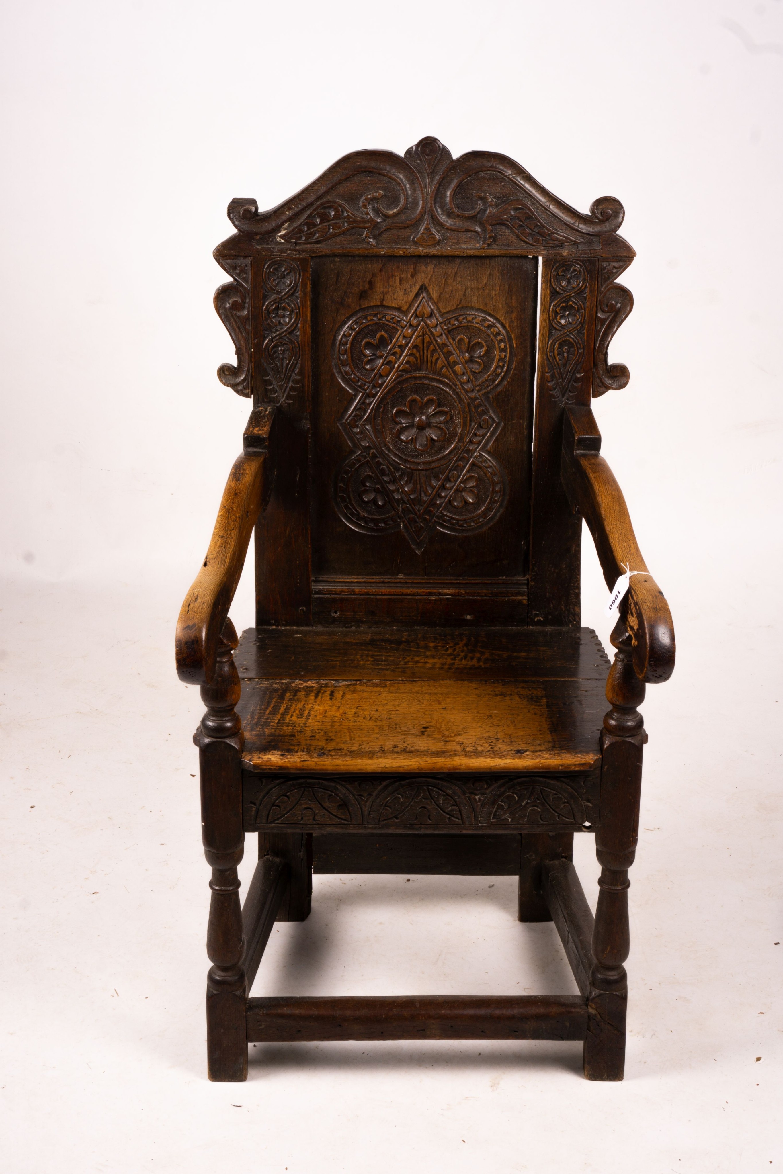 A 17th century style oak Wainscot chair, width 54cm, depth 52cm, height 104cm